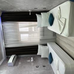 Номер улучшенный семейный с 2 односпальными кроватями