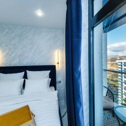 Фото Отель Уютная квартира с видом на горы