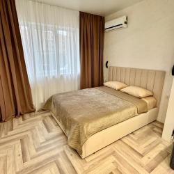 Фото Апартаменты на улице Октябрьская 181/2 корпус 3