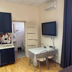 Номер студия с 4 односпальными кроватями