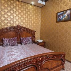 Номер люкс семейный с 1 двуспальной кроватью
