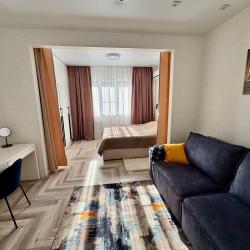 Фото Апартаменты на улице Октябрьская 181/2 корпус 3