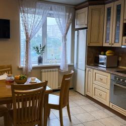 Фото Отель Уютная, новая однокомнатная квартира в центре города а