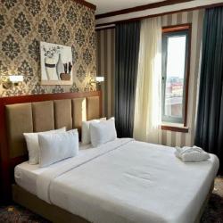 Фото Отель Rakat Komfort Hotel 大圣 (Ракат Комфорт)