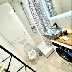 Фото Отель Moscow Apartment на улице Лётчика Ларюшина 10 корпус 1