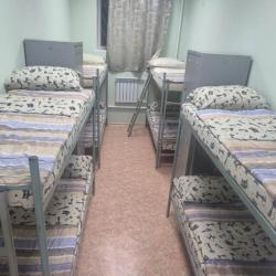 Кровать в 8-местном общем мужском номере