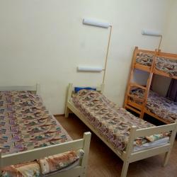Кровать в 7-местном общем номере