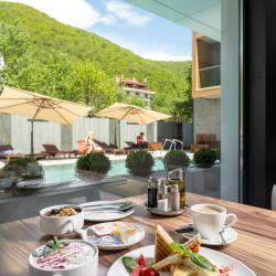 Фото Отель Ikos Polyana