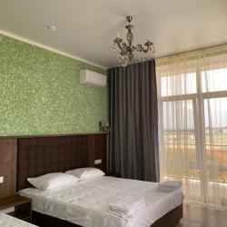 Номер стандарт улучшенный с 1 односпальной и 1 двуспальной кроватью