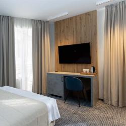 Фото Отель Ikos Polyana