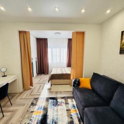 Фото Апартаменты на улице Октябрьская 181/2 корпус 3