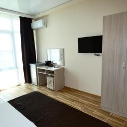 Комната стандарт с 1 двуспальной и 1 двухъярусной кроватью