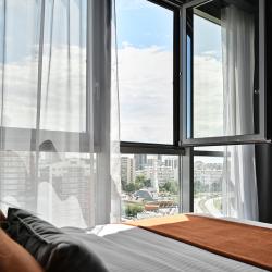 Апартаменты студия на 16 этаже ул.Ново-Садовая 106Гк1