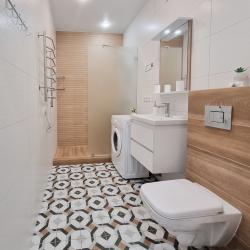 Фото Отель LovelyHome 39 (ЛавлиХоум 39) на улице Комсомольская 64