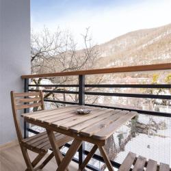 Фото Отель Ikos Polyana