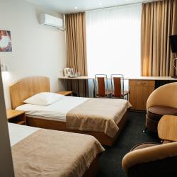 Номер стандарт с 2 односпальными кроватями с видом на город