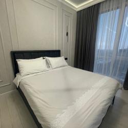 Фото Апартаменты на улице Владимира Радостовца 280 корпус 1