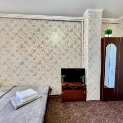 Комната эконом с 1 односпальной и 1 двуспальной кроватью