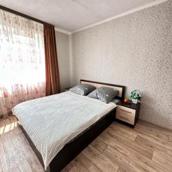 Фото Отель Ideal Apartment (Идеал Апартмент) на улице Первостроителей 1