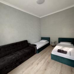 Фото Апартаменты Happy Home(ХэппиХоум) на улице Зураба Магкаева 83/3