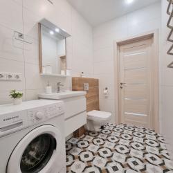 Фото Отель LovelyHome 39 (ЛавлиХоум 39) на улице Комсомольская 64