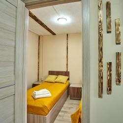 Коттедж стандарт с 2 односпальными кроватями и диваном