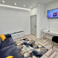 Фото Апартаменты на улице Октябрьская 181/2 корпус 3