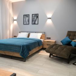 Фото Отель TroeSutokApart Металлургов 27