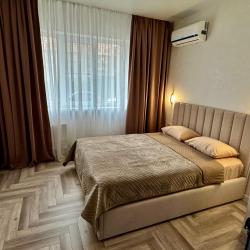 Фото Апартаменты на улице Октябрьская 181/2 корпус 3