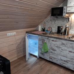 Фото Апартаменты мансарда на улице Бондарева 58а