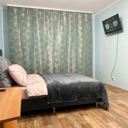 Фото Апартаменты на улице Комбайнеров 39Б