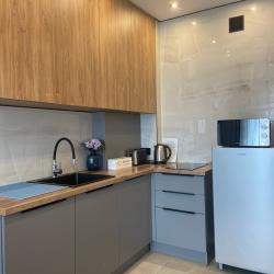 Фото Отель K_Apartments (К_Апартментс) на улице Гризодубовой 1/3