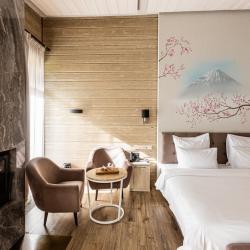 Фото Отель Охта Парк коттеджи