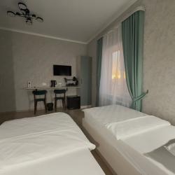 Номер стандарт улучшенный с 2 односпальными кроватями