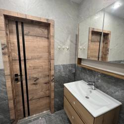 Фото Апартаменты на улице Кривошлыкова 11