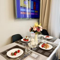 1-комнатные апартаменты люкс на 17 этаже с видом на реку Тура