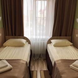 Номер стандарт с 2 односпальными кроватями (без кондиционера)
