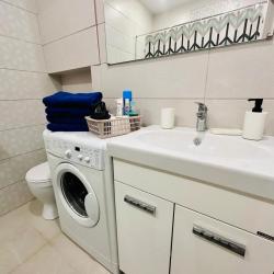 Фото Апартаменты на улице Мельникайте 38