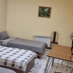 Номер эконом семейный с 3 односпальными кроватями (без окна)