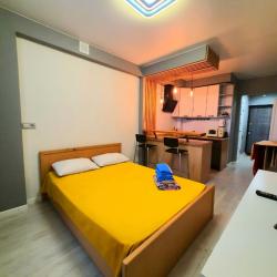 Фото Отель Уютная квартира-студия в новом микрорайоне