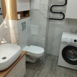 Фото Отель Современная двухкомнатная квартира с кухней-гостиной