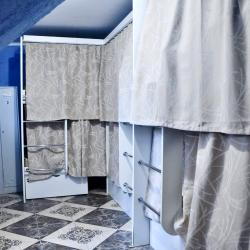 Кровать в общем номере с 3 двухъярусными кроватями (удобства на этаже)