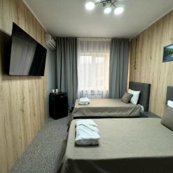 2-комнатный номер полулюкс с 2 односпальными и 1 двуспальной кроватью