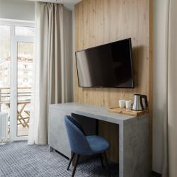 Фото Отель Ikos Polyana