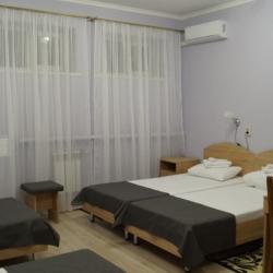 Номер улучшенный с 4 односпальными кроватями (корпус Б)