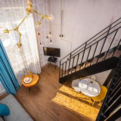 Двухуровневые апартаменты Лофт