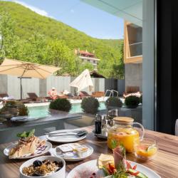 Фото Отель Ikos Polyana