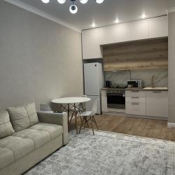 Фото Апартаменты на проспекте Туран 34Б
