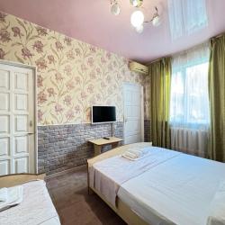 Номер стандарт улучшенный с 1 односпальной и 1 двуспальной кроватью