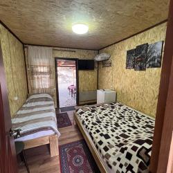 Фото Отель Гостевые домики Огонек